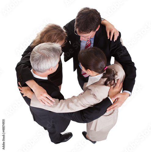 Photo: Businesspeople holding hands - teamwork Businesspeople holding hands - teamwork
