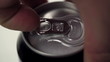 Opening a beverage can - closeup