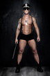 Conceptual photo of muscular, good looking police officer over t