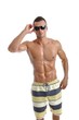 Powerful muscular man posing on a white background