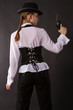 Photo: Portrait of beautiful young woman with a gun. Portrait of beautiful young woman with a gun.
