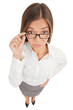 Suspicious angry secretary taking off her glasses