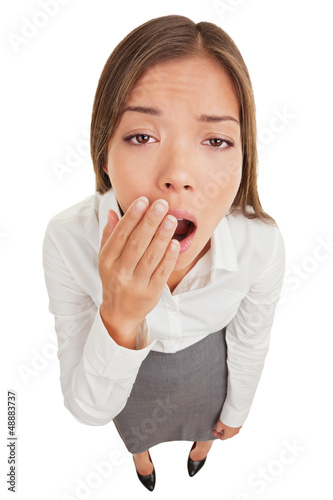 Photo: Exhausted or bored woman yawning Exhausted or bored woman yawning