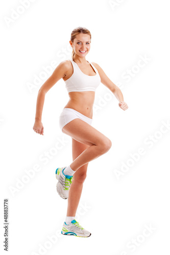 Photo: sporty woman over white sporty woman over white