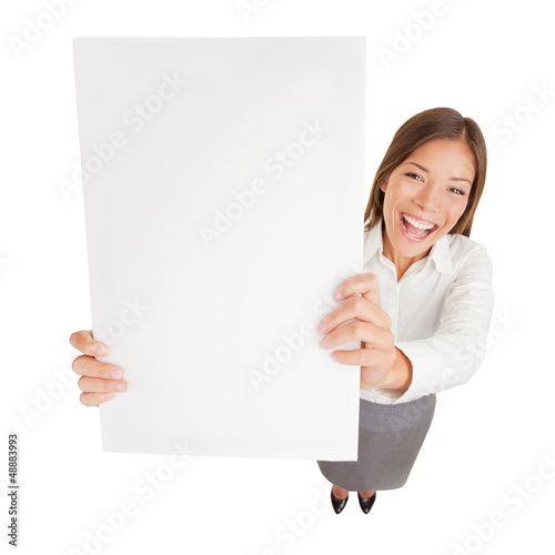 Photo: Businesswoman with blank sign excited Businesswoman with blank sign excited
