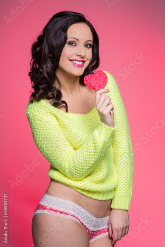 Photo: Sexy smiling woman with lollipop Sexy smiling woman with lollipop