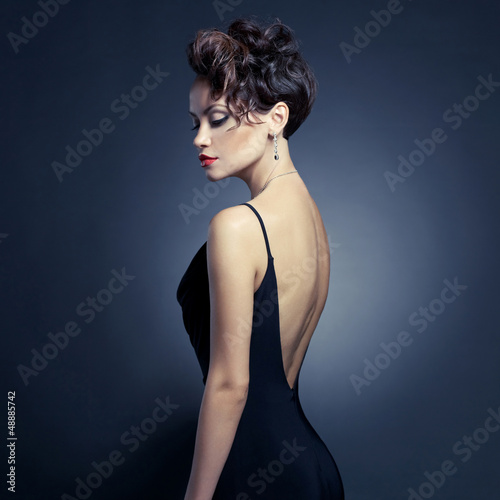 Photo: Elegant lady in evening dress Elegant lady in evening dress