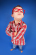 Funny portrait of a five years old sulky boy