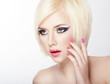 Beautiful woman with bright violet purple makeup