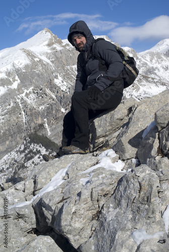 Photo: Hiker on top of the mountain Hiker on top of the mountain