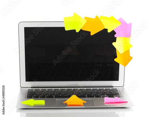 Photo: Laptop with empty stickers isolated on white Laptop with empty stickers isolated on white