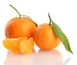 Ripe sweet tangerine with leaves, isolated on white