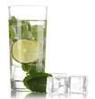 Glass of water with ice, mint and lime isolated on white