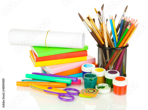 Photo: School supplies isolated on white School supplies isolated on white