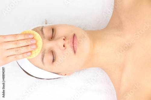 Photo: Young woman in spa salon Young woman in spa salon