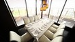 Table for ten persons stands in corner of hall of restaurant