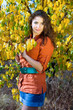charming young woman outdoors