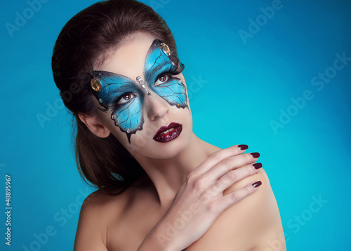 Photo: Fashion Make up. Butterfly makeup on face beautiful woman. Art P Fashion Make up. Butterfly makeup on face beautiful woman. Art P
