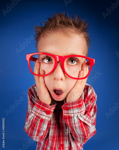 Photo: Five years old little boy with expressive face Five years old little boy with expressive face