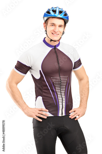 Photo: A male bicyclist with helmet posing A male bicyclist with helmet posing