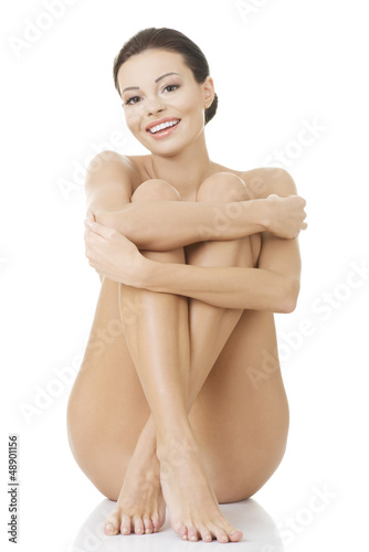 Photo: Naked woman with healthy clean skin Naked woman with healthy clean skin