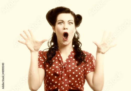 Photo: bright picture of surprised woman face over white bright picture of surprised woman face over white