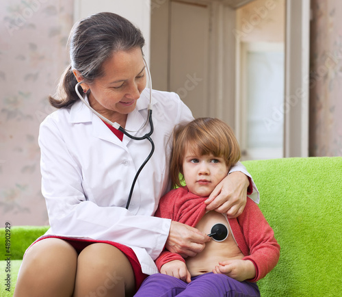 Photo: doctor examining 2 years baby doctor examining 2 years baby