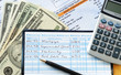 Photo: Write some checks to make payments for household expenses Write some checks to make payments for household expenses
