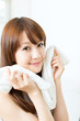 Beautiful asian woman relaxing in the bathroom