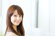 Beautiful asian woman relaxing in the bathroom