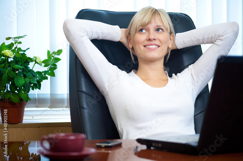 Photo: businesswoman in office businesswoman in office