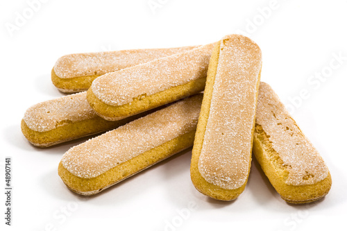Photo: Italian savoiardi cookies over white, ladyfingers Italian savoiardi cookies over white, ladyfingers