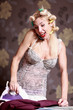 Housewife irons clothes and makeup corrects 
