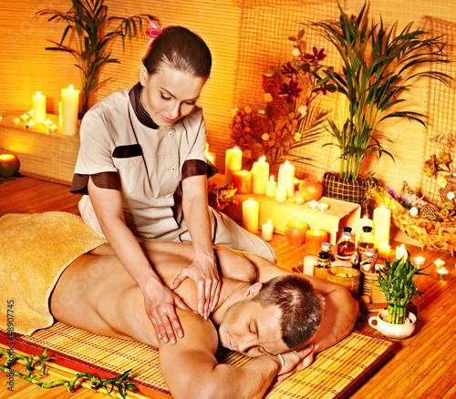 Photo: Woman getting bamboo massage. Woman getting bamboo massage.