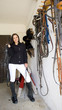 Photo: equestrian in a stable equestrian in a stable