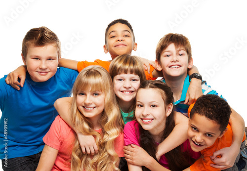 Photo: Happy kids together hugging Happy kids together hugging