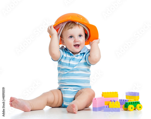 Photo: kid playing with building blocks toy kid playing with building blocks toy