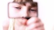 Video: Little boy moves loupe in front of his face and enlarge it Little boy moves loupe in front of his face and enlarge it