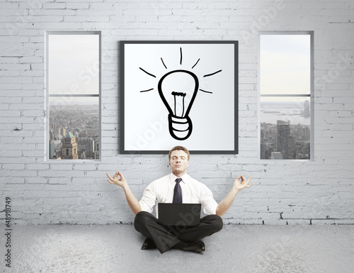 Photo: businessman meditating businessman meditating