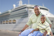 Happy Father and Son In Front of Cruise Ship