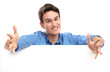 Young man with blank board