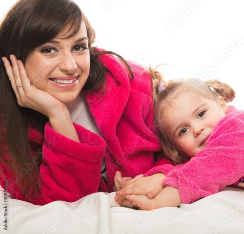Photo: Happy mother and daughter in dressing gowns Happy mother and daughter in dressing gowns
