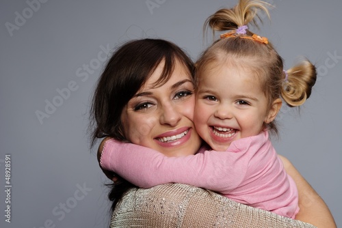 Photo: Happy mother and daughter portrait Happy mother and daughter portrait
