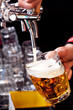 Foto: pouring beer into the glass pouring beer into the glass