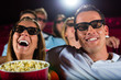 Foto: Young people watching 3d movie at movie theater Young people watching 3d movie at movie theater