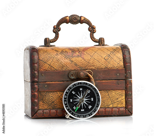Photo: chest and compass isolated on white background chest and compass isolated on white background