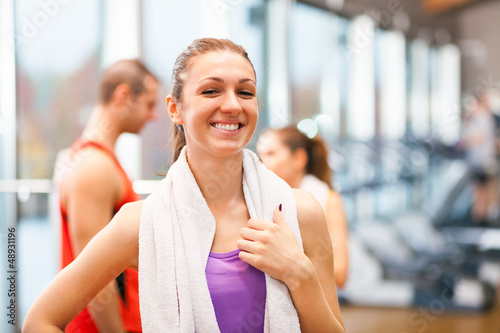 Photo: Woman smiling in a fitness club Woman smiling in a fitness club