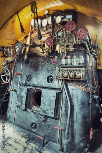 Photo: vintage engine room of a steam train vintage engine room of a steam train