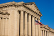 Flag Flying In Front of Government Building