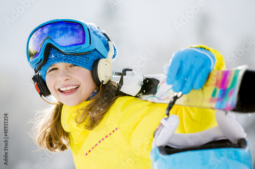 Photo: Skiing, winter sports - portrait of young skier Skiing, winter sports - portrait of young skier
